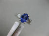 1.63CT ROUND DIAMOND & AAA OVAL TANZANITE 14K WHITE GOLD 3 STONE ENGAGEMENT RING