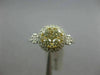 ESTATE WIDE .85CT WHITE & FANCY YELLOW DIAMOND 14K YELLOW GOLD HALO CLUSTER RING
