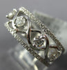 ESTATE WIDE .68CT DIAMOND 18K WHITE GOLD INFINITY SEMI ETERNITY ANNIVERSARY RING