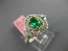 ESTATE 1.21CT DIAMOND & AAA EMERALD 18KT 2 TONE GOLD DOUBLE HALO ENGAGEMENT RING