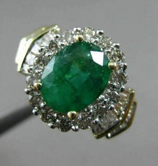 ESTATE 1.82CT ROUND & BAGUETTE DIAMOND & AAA EMERALD 14K TWO TONE GOLD HALO RING