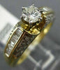 ESTATE 1.20CT ROUND & BAGUETTE DIAMOND 14KT YELLOW GOLD CLASSIC ENGAGEMENT RING