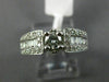 ESTATE .90CT ROUND & BAGUETTE DIAMOND 14KT WHITE GOLD FOUR PRONG ENGAGEMENT RING
