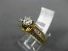 ESTATE 1.20CT ROUND & BAGUETTE DIAMOND 14KT YELLOW GOLD CLASSIC ENGAGEMENT RING