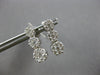 1.0CT DIAMOND 14KT WHITE GOLD 3D MULTI FLOWER JOURNEY SCREWBACK HANGING EARRINGS