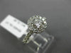 ESTATE .95CT ROUND DIAMOND 14KT WHITE GOLD CLASSIC 4 PRONG HALO ENGAGEMENT RING