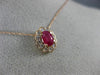 ESTATE .71CT DIAMOND & AAA OVAL CUT RUBY 14KT ROSE GOLD FLOWER FLOATING PENDANT