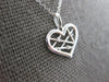 ESTATE .01CT DIAMOND 14K WHITE GOLD ROUND CRISS CROSS HEART FUN FLOATING PENDANT