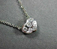 ESTATE .18CT DIAMOND 14KT WHITE GOLD 3D SIX STONE ETOILE HEART PENDENT #1722
