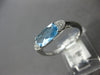 ESTATE 1.22CT DIAMOND & AAA BLUE TOPAZ 14KT WHITE GOLD CUSHION & ROUND FUN RING