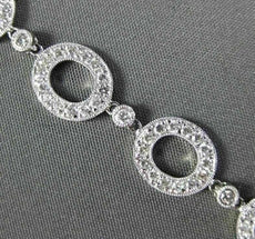 ESTATE 2.12CT DIAMOND 18KT WHITE GOLD CIRCULAR OVAL BY THE YARD TENNIS BRACELET