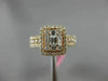 ESTATE LARGE 1.13CT ROUND & BAGUETTE DIAMOND 18KT ROSE GOLD HALO ENGAGEMENT RING