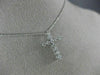 ESTATE .25CT DIAMOND 14KT WHITE GOLD 3D ROUND CLASSIC FLOATING CROSS PENDANT