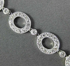 ESTATE 2.12CT DIAMOND 18KT WHITE GOLD CIRCULAR OVAL BY THE YARD TENNIS BRACELET