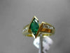 ESTATE 1.10CTW DIAMOND & AAA MARQUISE EMERALD 14KT YELLOW GOLD ENGAGEMENT RING