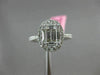 ESTATE LARGE .69CT ROUND & BAGUETTE DIAMOND 18KT WHITE GOLD OVAL ENGAGMENT RING