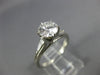 ESTATE 1.17CT DIAMOND PLATINUM 3D ROUND AND BAGUETTE 3 STONE ENGAGEMENT RING