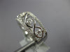 ESTATE WIDE .68CT DIAMOND 18K WHITE GOLD INFINITY SEMI ETERNITY ANNIVERSARY RING