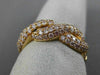 ESTATE LARGE .90CT PINK DIAMOND 18KT ROSE GOLD INFINITY KNOT SEMI ETERNITY RING