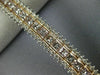 ESTATE WIDE 11.12CT WHITE & PINK DIAMOND 18KT WHITE & ROSE GOLD TENNIS BRACELET