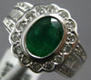 WIDE 2.19CT DIAMOND & EMERALD 18KT WHITE GOLD OVAL ROUND & BAGUETTE FLOWER RING