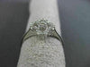 ANTIQUE SMALL .16CT DIAMOND 14KT WHITE GOLD FLORAL FOUR PETAL PAVE CLUSTER RING