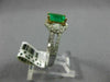1.44CT DIAMOND & COLOMBIAN EMERALD 14KT 2 TONE GOLD 3 STONE HALO ENGAGEMENT RING