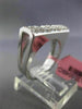 ESTATE .60CT ROUND & PRINCESS DIAMOND 18KT WHITE GOLD RECTANGULAR INVISIBLE RING