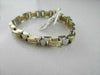 ESTATE WIDE 14K TWO TONE PRINCESS CUT DIAMOND BRACELET