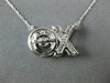 ESTATE .15CT DIAMOND 14K WHITE GOLD 3D DANCING DIAMOND XO FLOATING LOVE NECKLACE