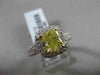 ESTATE 2.26CTW GIA FANCY YELLOW DIAMOND 18KT WHITE GOLD HALO ENGAGEMENT RING