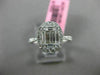 ESTATE LARGE .69CT ROUND & BAGUETTE DIAMOND 18KT WHITE GOLD OVAL ENGAGMENT RING