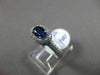 ESTATE 1.03CT DIAMOND & AAA SAPPHIRE 18KT WHITE GOLD HALO DESIGN ENGAGEMENT RING