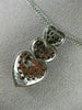 ESTATE .78CT WHITE & BLACK DIAMOND 14KT WHITE GOLD TRIPLE HEART JOURNEY PENDANT