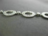 ESTATE 2.12CT DIAMOND 18KT WHITE GOLD CIRCULAR OVAL BY THE YARD TENNIS BRACELET