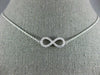 ESTATE .40CT DIAMOND 18KT WHITE GOLD 3D CLASSIC INFINITY LOVE NECKLACE