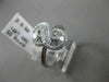 ESTATE .50CT ROUND & BAGUETTE DIAMOND 14KT WHITE GOLD FOREVER INFINITY LOVE RING