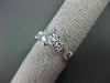 ESTATE 1.12CT ROUND & BAGUETTE DIAMOND 14KT WHITE GOLD SOLITAIRE ENGAGEMENT RING