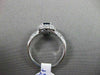 ESTATE 1.03CT DIAMOND & AAA SAPPHIRE 18KT WHITE GOLD HALO DESIGN ENGAGEMENT RING
