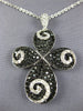 ESTATE LARGE 2.68CT WHITE & BLACK DIAMOND 18KT WHITE GOLD INFINITY CROSS PENDANT