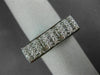 ESTATE .60CT DIAMOND 18KT WHITE GOLD ROUND & PRINCESS INVISIBLE ANNIVERSARY RING