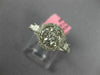 ESTATE .86CT DIAMOND 18KT WHITE GOLD 3D ROUND & PRINCESS FLOWER HALO LOVE RING