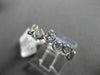 ESTATE .75CT ROUND DIAMOND 14KT WHITE GOLD WAVE BEZEL ETOILE ANNIVERSARY RING