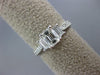 ESTATE .82CT DIAMOND PLATINUM THREE STONE EMERALD CUT FILIGREE ENGAGEMENT RING