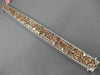 WIDE 22.84CT WHITE & PINK DIAMOND 18KT WHITE & ROSE GOLD CLUSTER TENNIS BRACELET