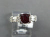 1.61CT DIAMOND & AAA RUBY 18KT WHITE GOLD 3D EMERALD CUT & ROUND ENGAGEMENT RING