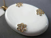 ESTATE LARGE .45CT DIAMOND & AAA WHITE ENAMEL 14KT ROSE GOLD FLOWER LOVE PENDANT