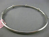 ESTATE .30CT DIAMOND 14KT WHITE GOLD PAST PRESENT FUTURE CIRCLE BANGLE BRACELET