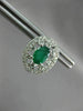 ESTATE 1.32CT DIAMOND & AAA EMERALD 14KT WHITE GOLD OVAL FLOWER HUGGIE EARRINGS