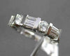 ESTATE .64CTW BAGUETTE & ROUND DIAMOND 14KT WHITE GOLD ANNIVERSARY RING F/G VSSI